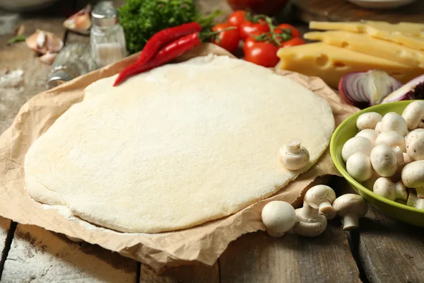 Food ingredients for pizza on table close up — Stock Photo, Image