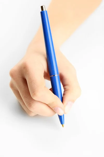 Vrouwelijke hand met pen — Stockfoto