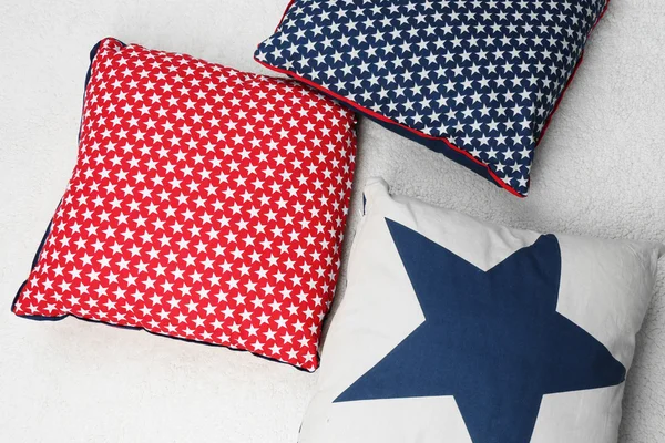 Decorative pillows on plaid close up — Stock Photo, Image