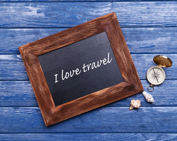 Travel inscription on wooden background — Stock Photo, Image