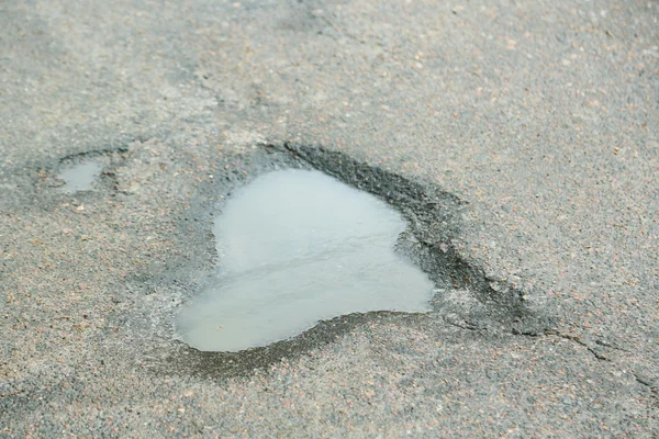 Broken asphalt close up — Stock Photo, Image