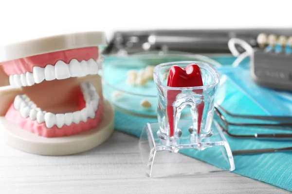 White teeth and dental instruments — Stock Photo, Image