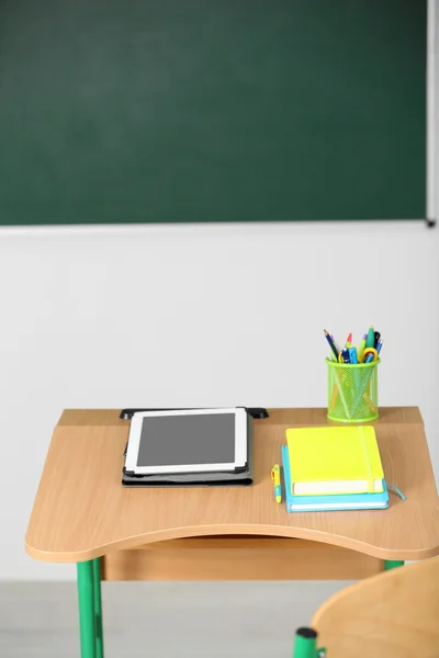 Wooden desk with stationery — Stock Photo, Image