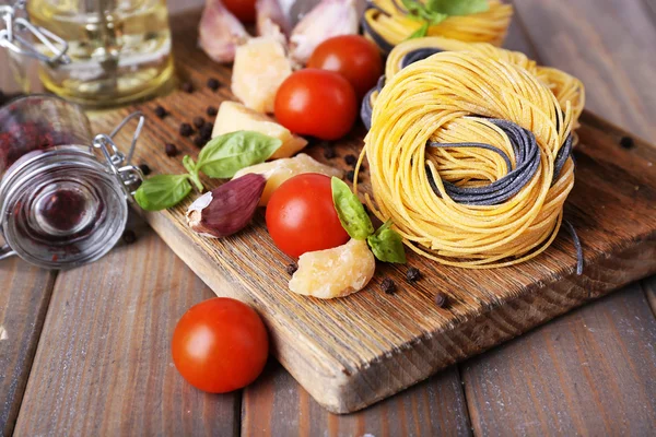 Raw pasta with cheese — Stock Photo, Image