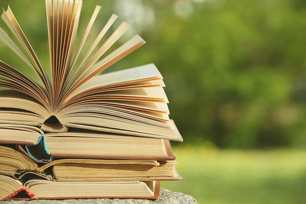 Stack of books outdoors