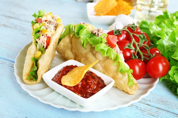 Tasty taco on plate — Stock Photo, Image