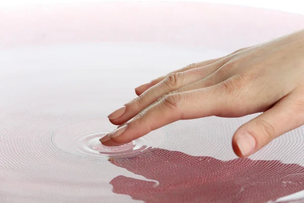 Finger touches water close up — Stock Photo, Image
