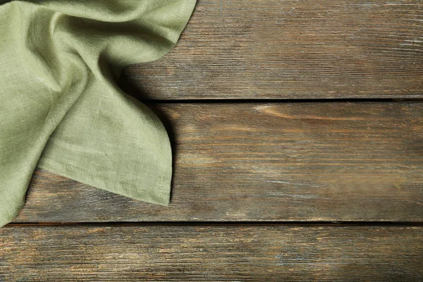 Napkin on wooden table — Stock Photo, Image