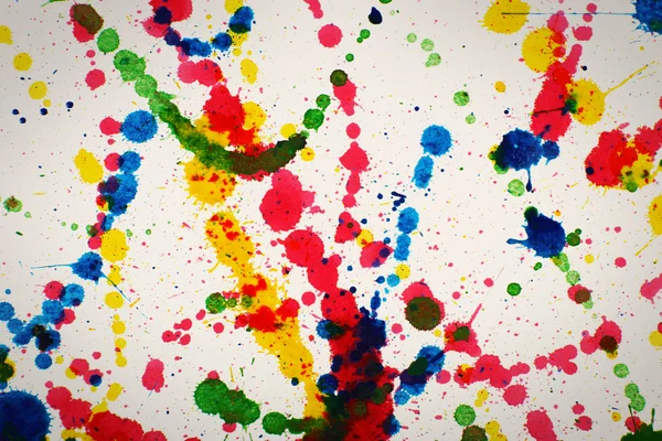 Des éclaboussures colorées de peinture comme fond — Photo
