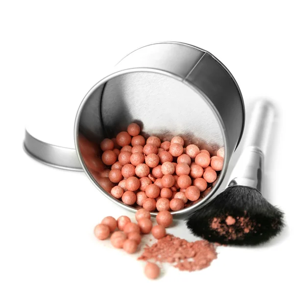 Jar with cosmetic powder balls and makeup brush — Stock Photo, Image