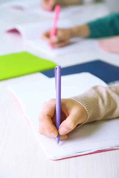 Hands of students at school — Stock Photo, Image