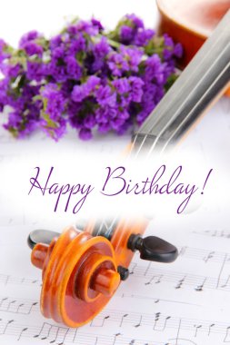 Classical violin  with flowers on notes background clipart