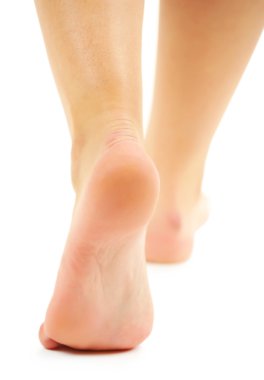 Beyaz arka plan üzerinde izole güzel kadın bacakları