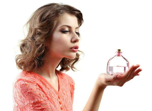 Hermosa mujer con frasco de perfume aislado en blanco —  Fotos de Stock