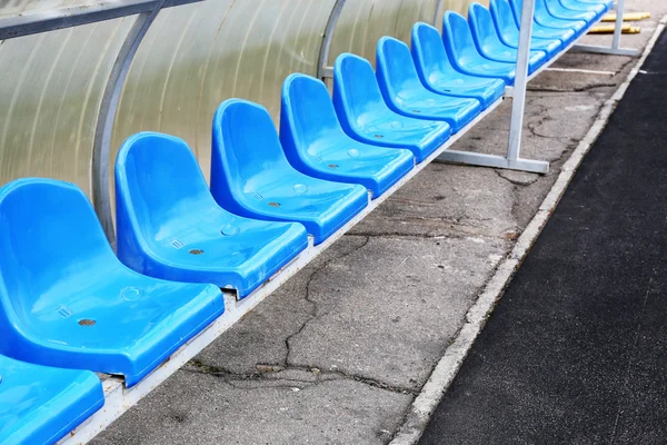 Asientos azules vacíos en el estadio — Foto de Stock