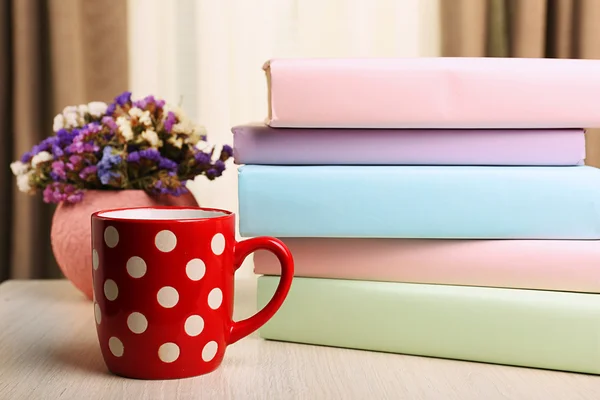 Books, cup and plant — Stock Photo, Image