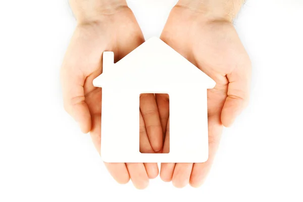 Female hands holding house — Stock Photo, Image