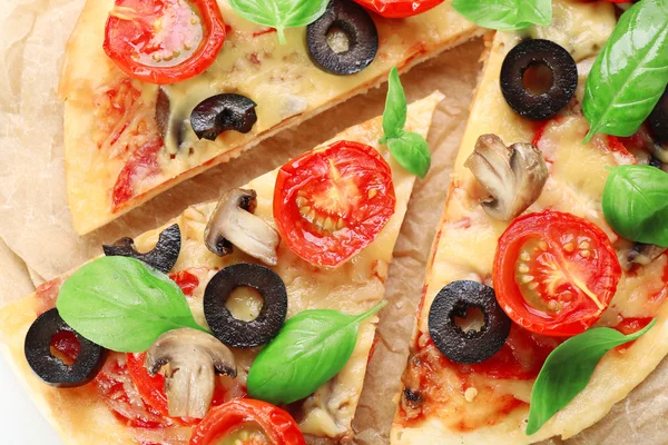 Tasty pizza with vegetables and basil — Stock Photo, Image