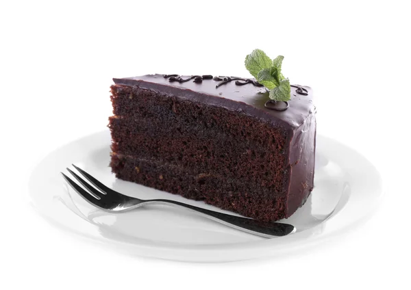 Parça üzerinde beyaz izole nane ile çikolatalı kek — Stok fotoğraf