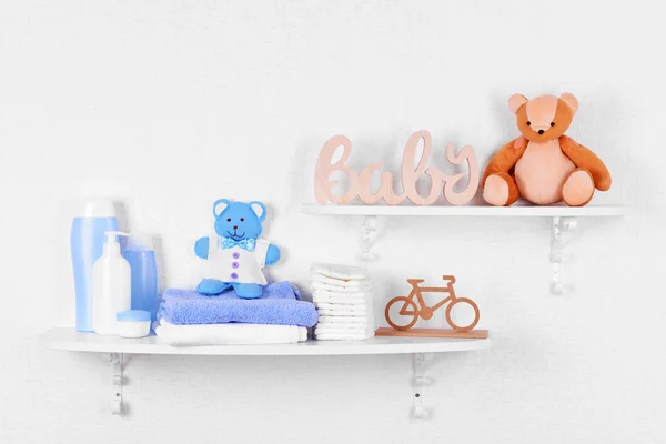 Baby accessories on shelves close-up — Stock Image Baby accessories on shelves close-up Royalty Free Stock Photos