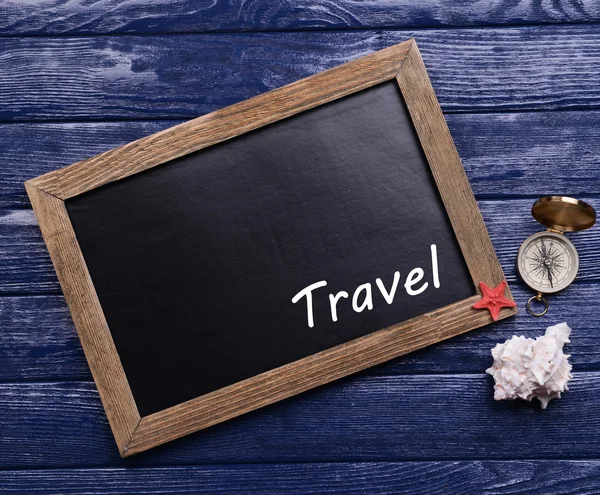 Travel inscription on wooden background — Stock Photo, Image