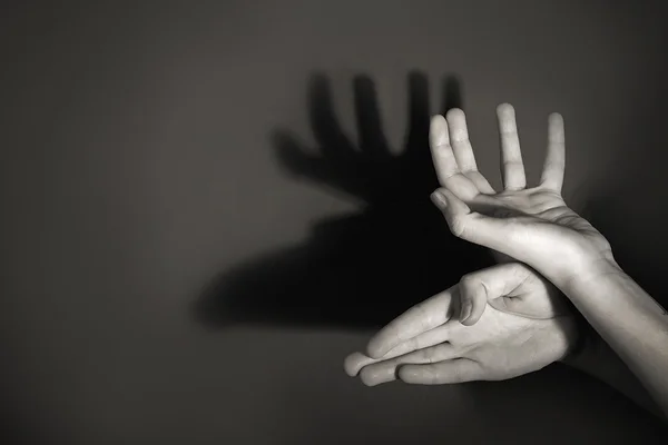 Hands gesture like deer on gray background — Stock Photo, Image