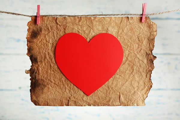 Bright heart and card hanging on rope — Stock Photo, Image