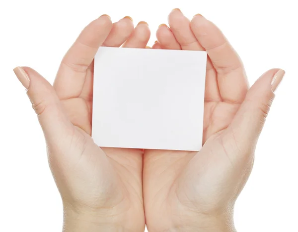 Mãos segurando cartão em branco isolado no branco — Fotografia de Stock