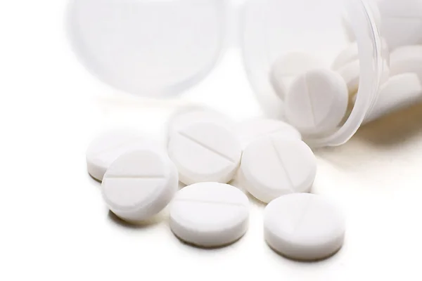 Pile of pills isolated on white — Stock Photo, Image