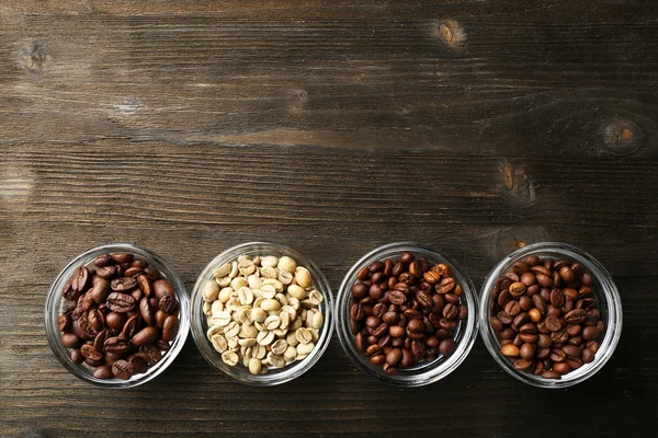 Coffee beans in saucers — Stock Photo, Image