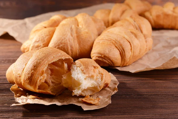 Delicious croissants on table close-up — Stock Photo, Image
