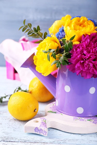 Composition with fresh spring flowers on wooden background — Stock Photo, Image