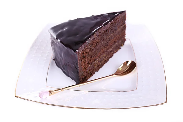 Κομμάτι κέικ σοκολάτας απομονωμένο σε λευκό — Φωτογραφία Αρχείου