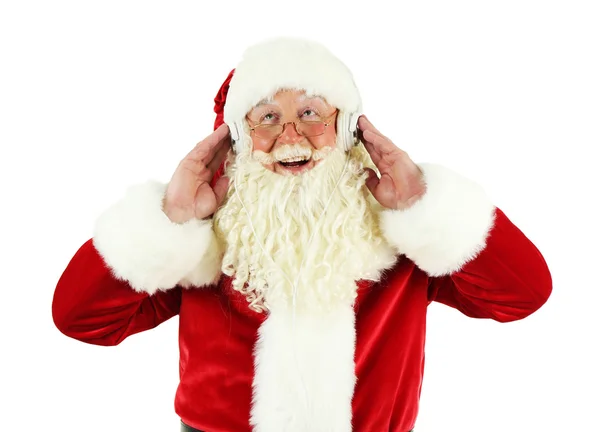 Babbo Natale con cuffie che ascoltano musica, isolato su sfondo bianco — Foto Stock