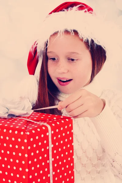 Beautiful little girl with present box — Stock Photo, Image