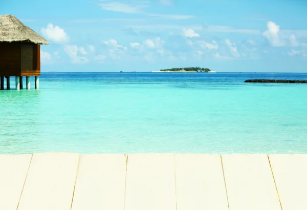 Ocean vatten och bungalows i Baros Maldives — Stockfoto