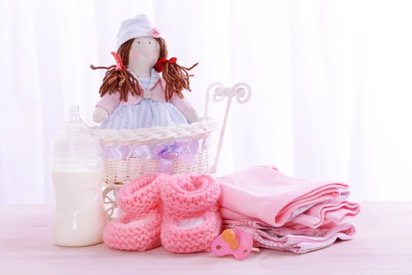 Baby accessories on table on light background — Stock Photo, Image