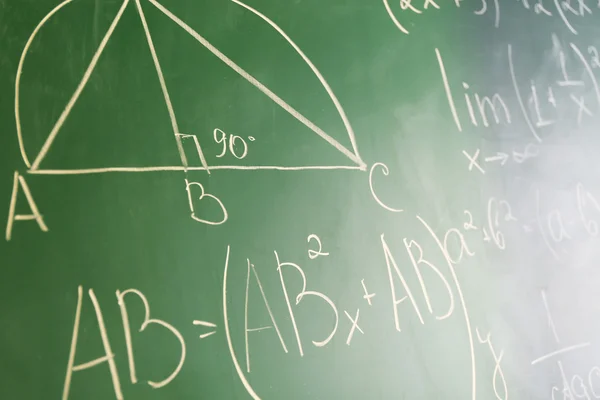 Mathematics formulas on blackboard background — Stock Photo, Image