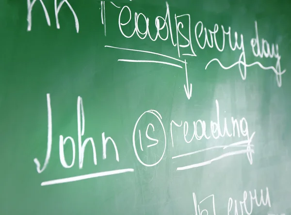 Profesor mano escritura gramática frases — Foto de Stock