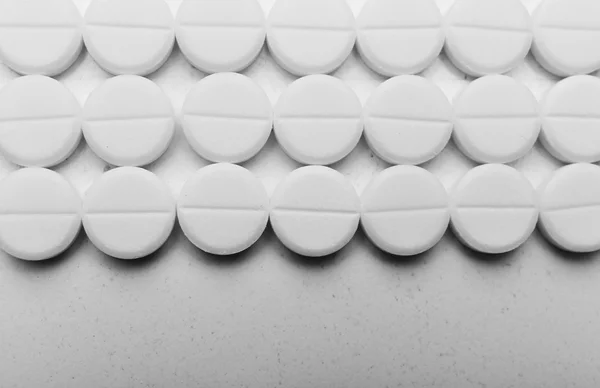 Pile of white pills, closeup — Stock Photo, Image