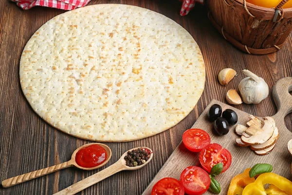 Ingredients for cooking pizza on wooden table, closeup — Stock Photo, Image