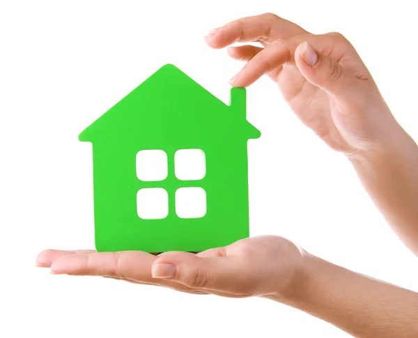 Female hands with small model of house isolated on white — Stock Photo, Image