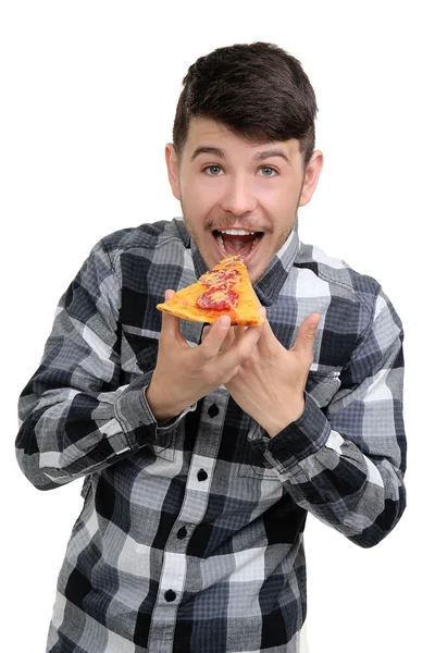 Νεαρός άνδρας τρώει κομματιού της πίτσας που απομονώνονται σε λευκό — Φωτογραφία Αρχείου