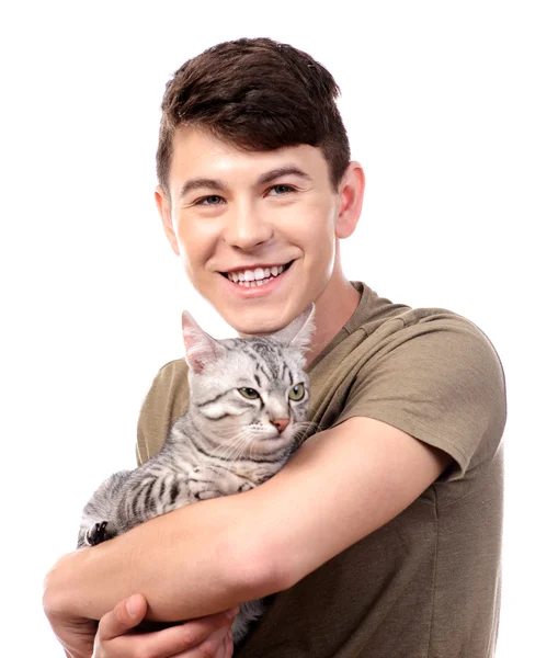 Guapo joven con lindo gato aislado en blanco —  Fotos de Stock