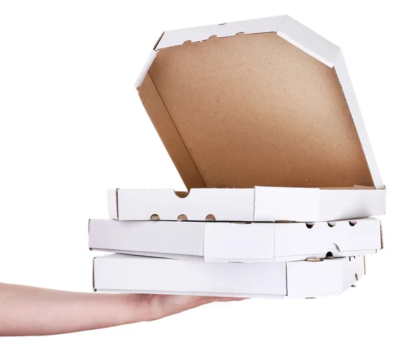 白で隔離のピザの箱を持っている手 — ストック写真