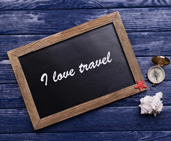 Travel inscription on wooden background — Stock Photo, Image