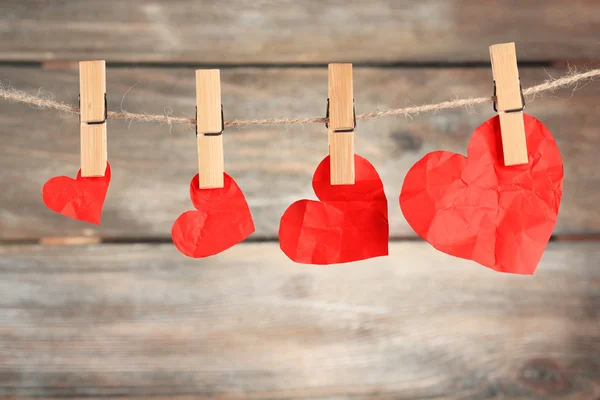 Bright hearts hanging on rope — Stock Photo, Image