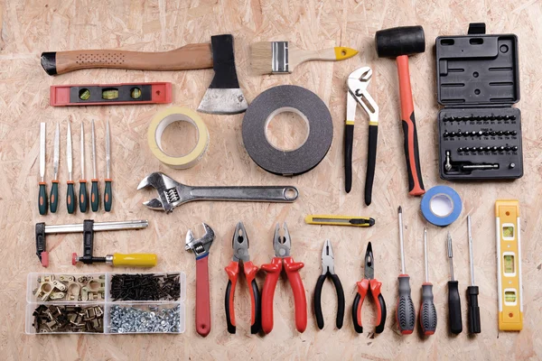 Conjunto de herramientas en madera contrachapada, vista superior — Foto de Stock