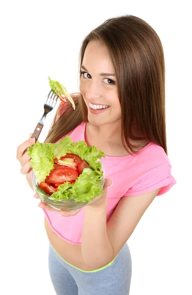 Giovane donna magra con ciotola di vetro di insalata dieta isolata su bianco — Foto Stock