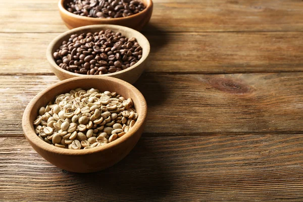 Coffee beans on wooden background — Stock Photo, Image